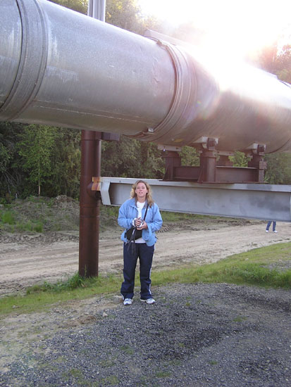 Stacey next to pipeline